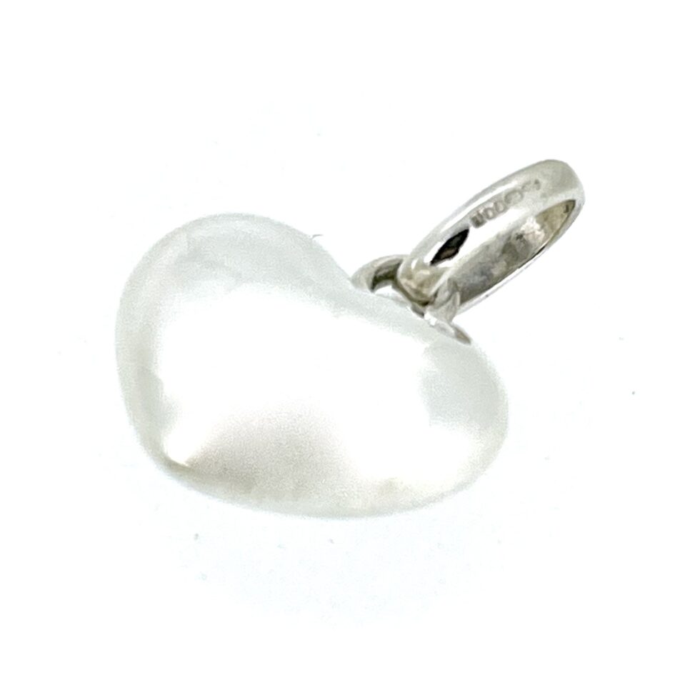 side of the vintage 2009 Links of London Puffed Heart Charm in sterling silver.