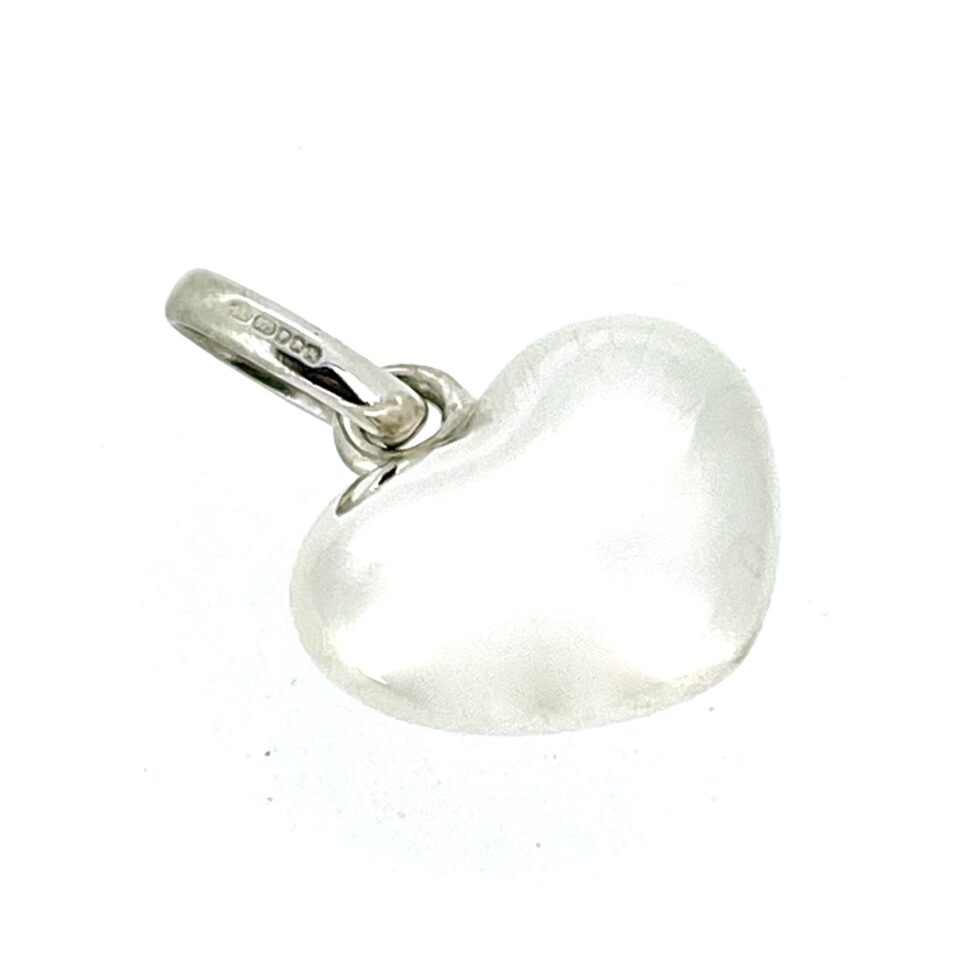 side view of the vintage 2009 Links of London Puffed Heart Charm in sterling silver.