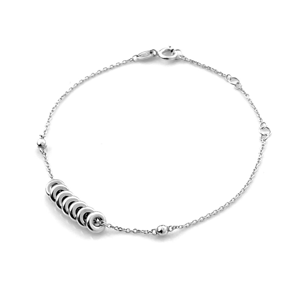Sweetie Chain Bracelet laid flat to display its adjustable lengths and design.