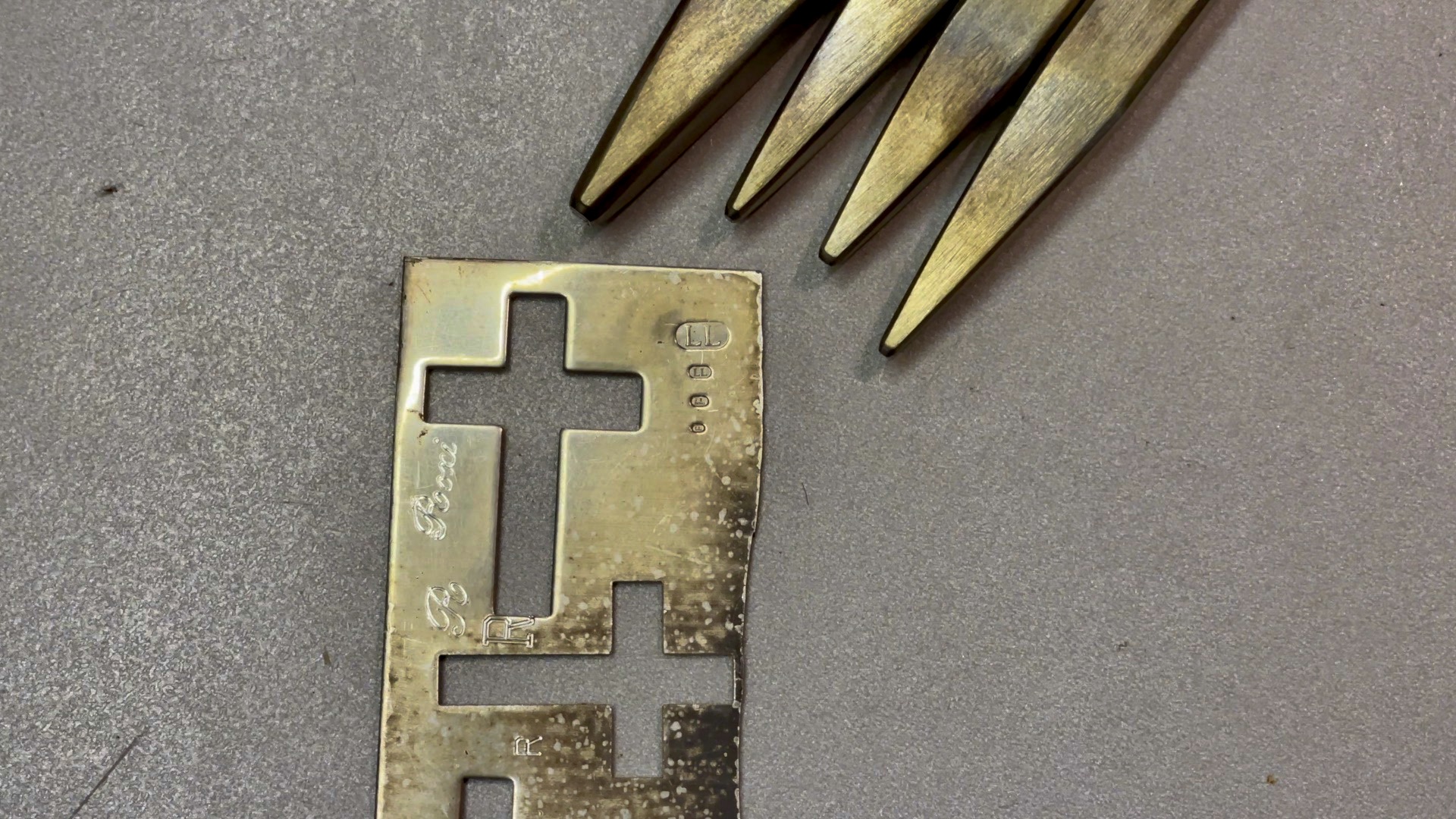 Close-up of sterling silver with fresh hallmarks.