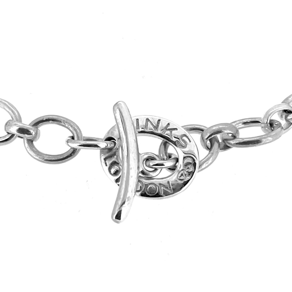 A close-up of the toggle clasp with the "Links London" engraving.