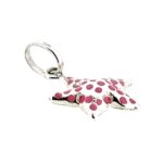 Side view showcasing the pink enamel details on the charm’s curved top.