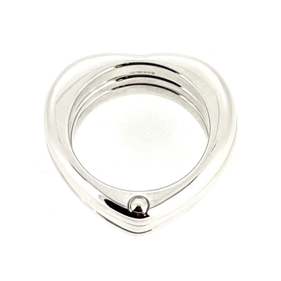 A soft-focus image capturing the modern yet timeless appeal of the Love Note Heart Ring.