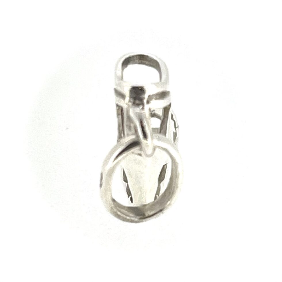 A close-up of the oval loop/bail attachment for secure wear.