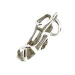 Top-down view showing the intricate floral cutout in the wedge heel.