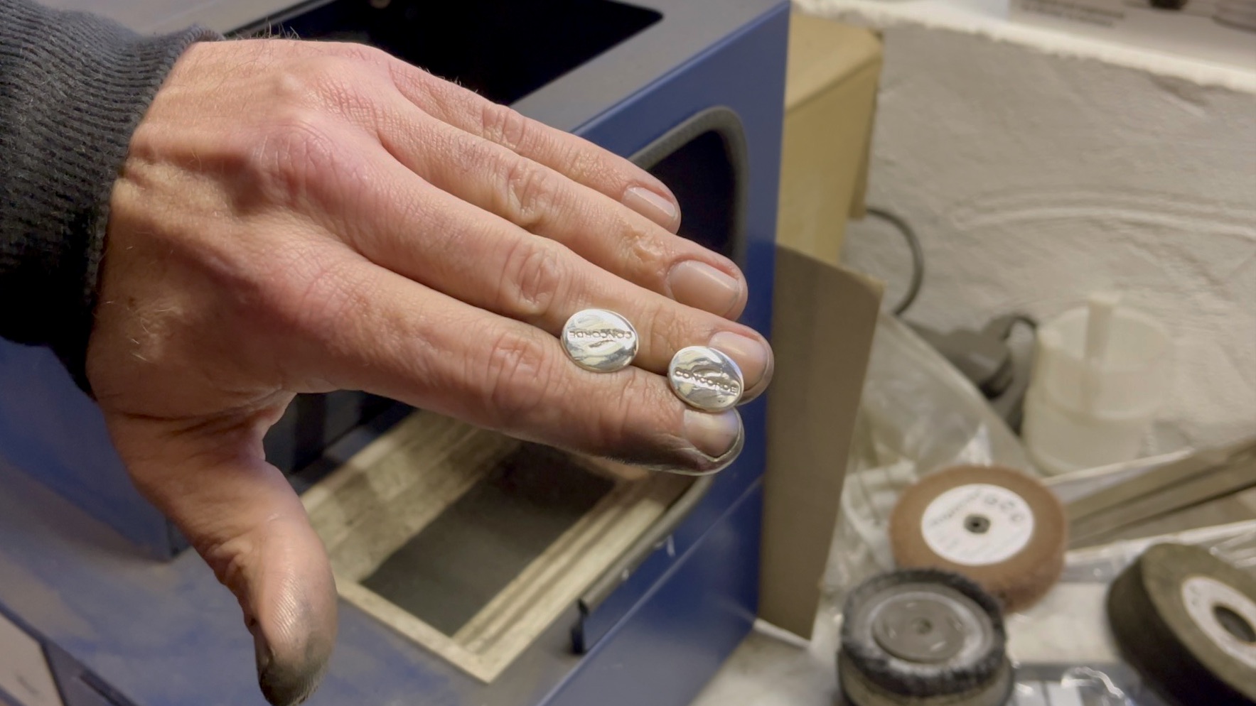 Mirror-finished oval cufflink backs after restoration