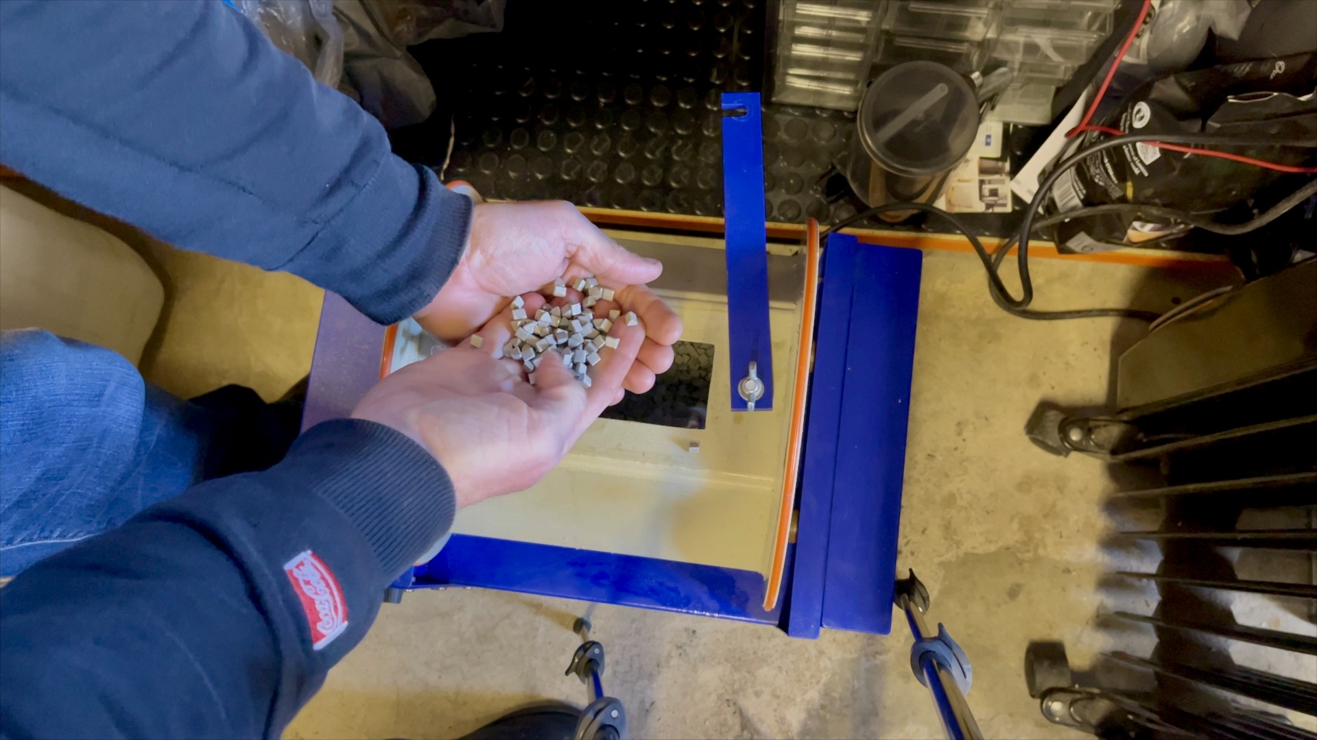 The Links of London charm in a barrel polisher with ceramic media.