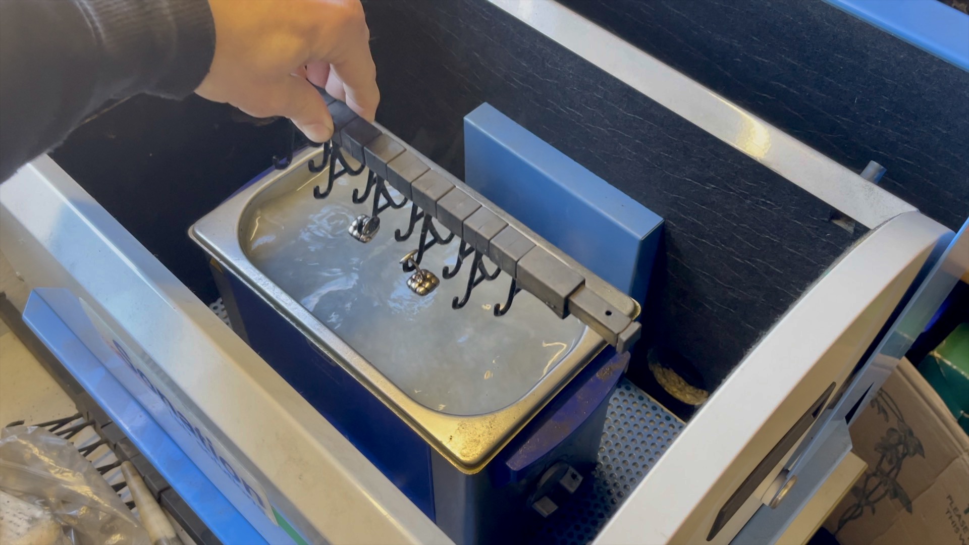 Ultrasonic cleaning of silver cufflinks at Links London