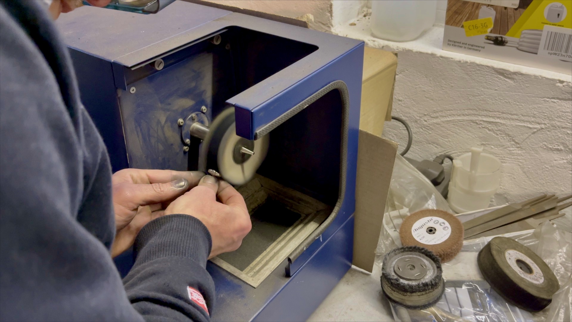 Polishing cufflinks with a soft mop wheel for a mirror finish