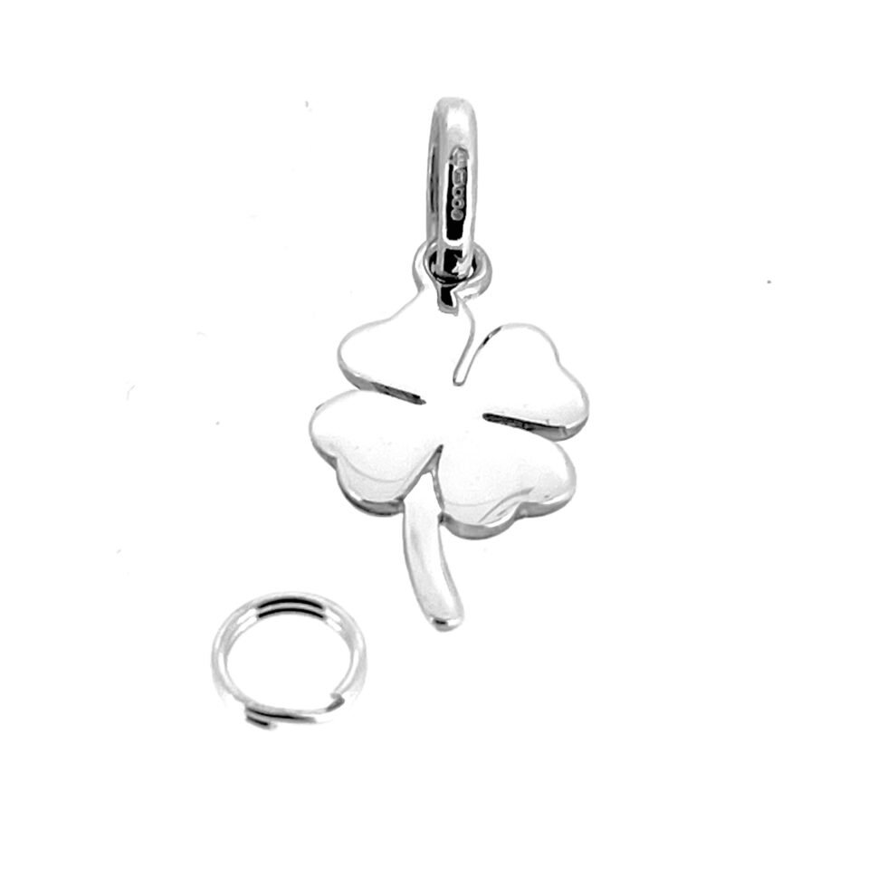 Four Leaf Clover Charm on a white background, highlighting its restored brilliance.