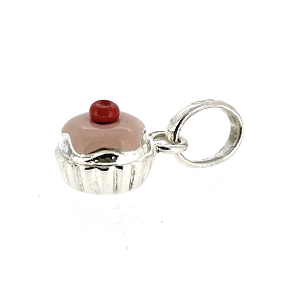 Side profile of the restored vintage cupcake charm