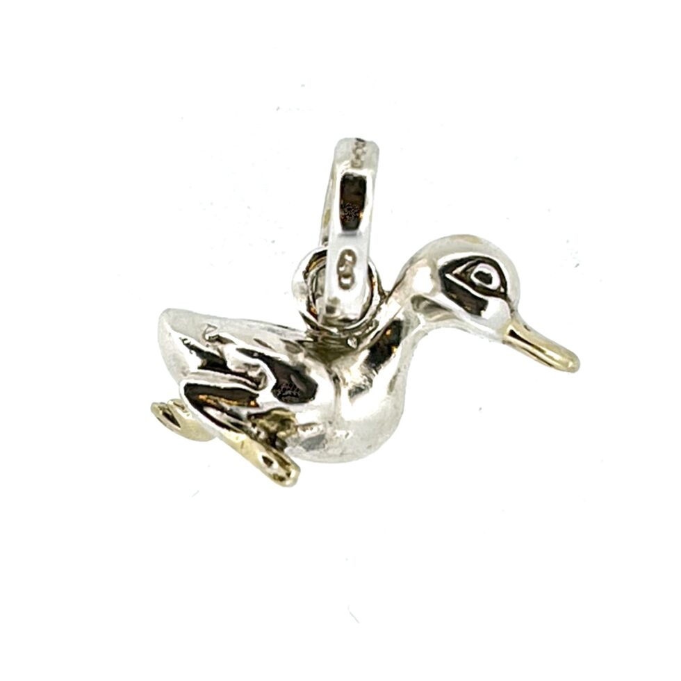 Close-up of duck’s polished finish and gold details