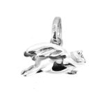 Close-up of hallmarked sterling silver pig charm