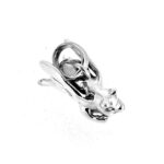 Sterling silver charm shaped like a pig with wings