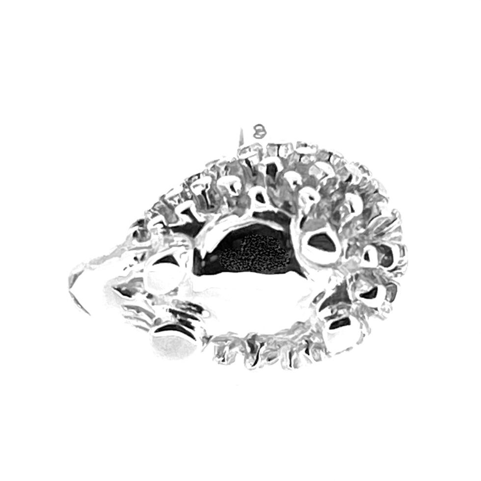 Reverse side of charm showing smooth base