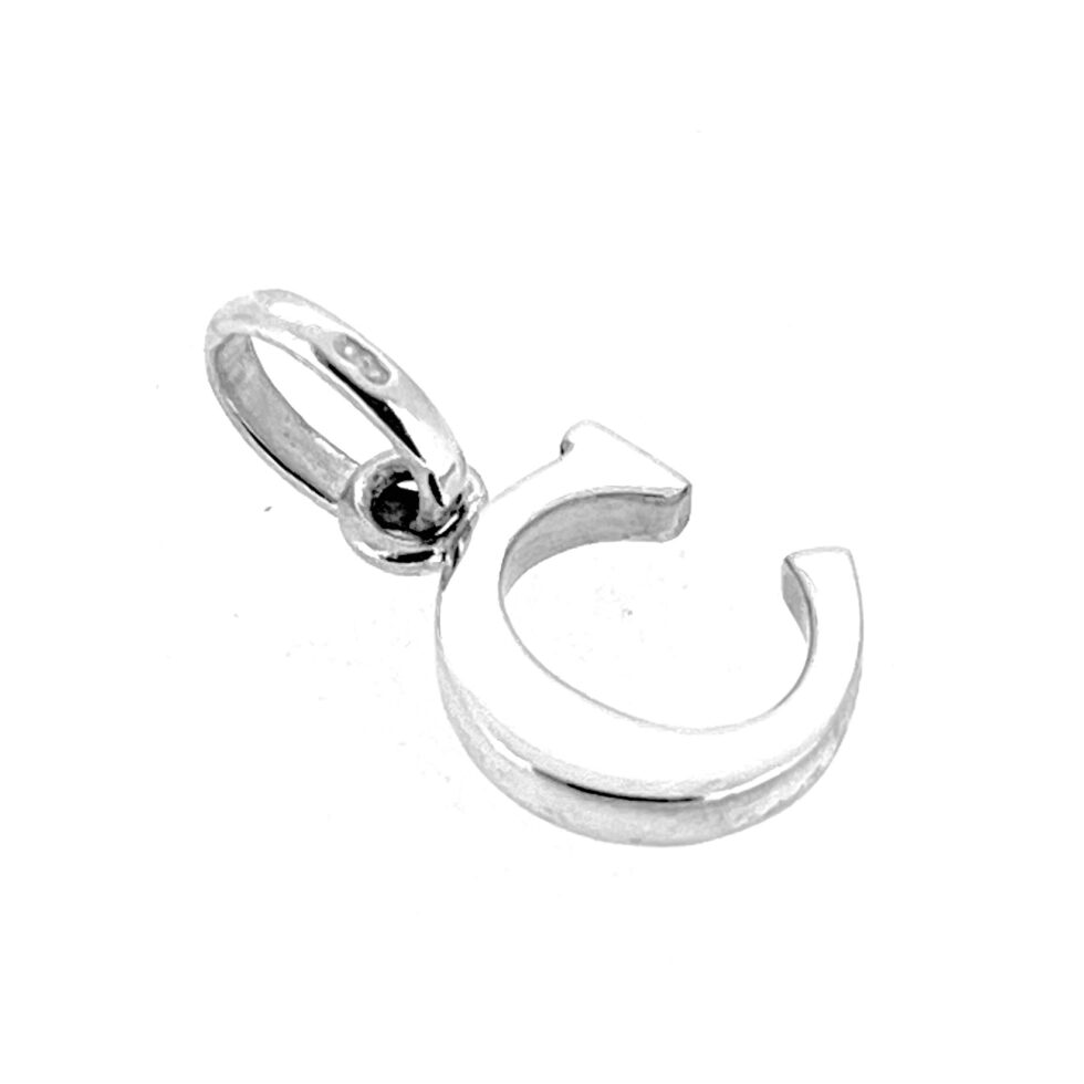 Side view of sterling silver “C” charm