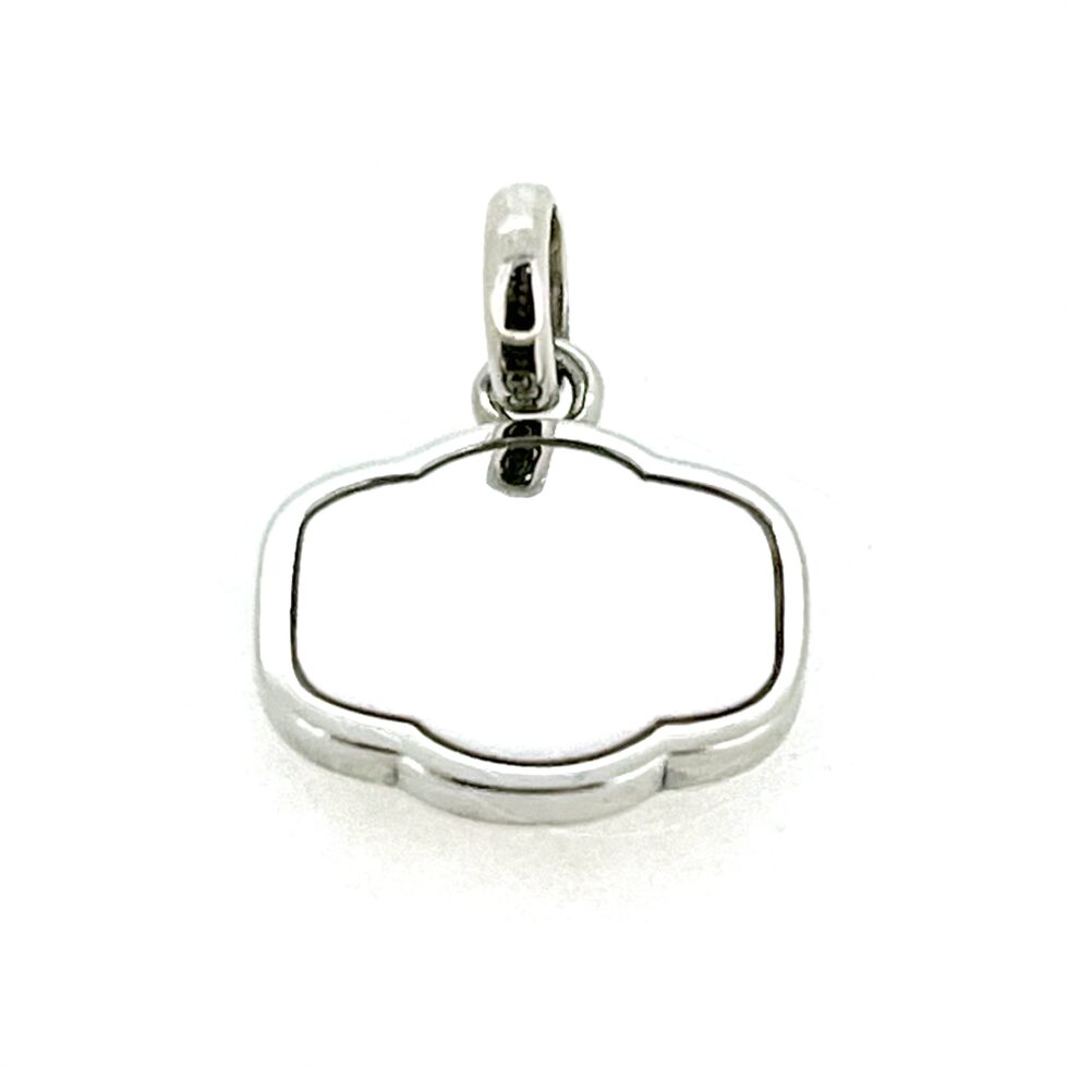 Reverse polished silver side of charm