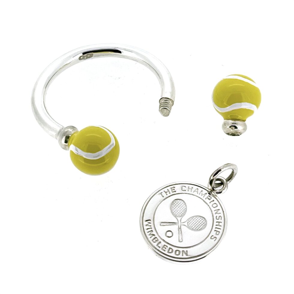 Keyring opened to reveal threaded screw mechanism on one tennis ball end.
