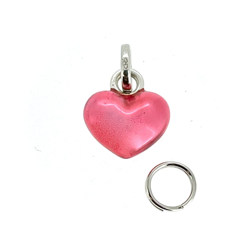 Charm viewed from front showing heart shape and shine