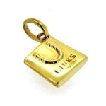 Polished and restored vintage gold vermeil charm.