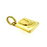 Side view of Links London shopping bag charm.
