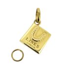 Polished gold vermeil bag charm with split ring.