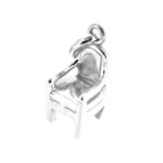 Miniature chair charm showing armrests