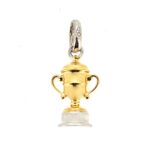 Ascot-inspired gold cup charm on white background