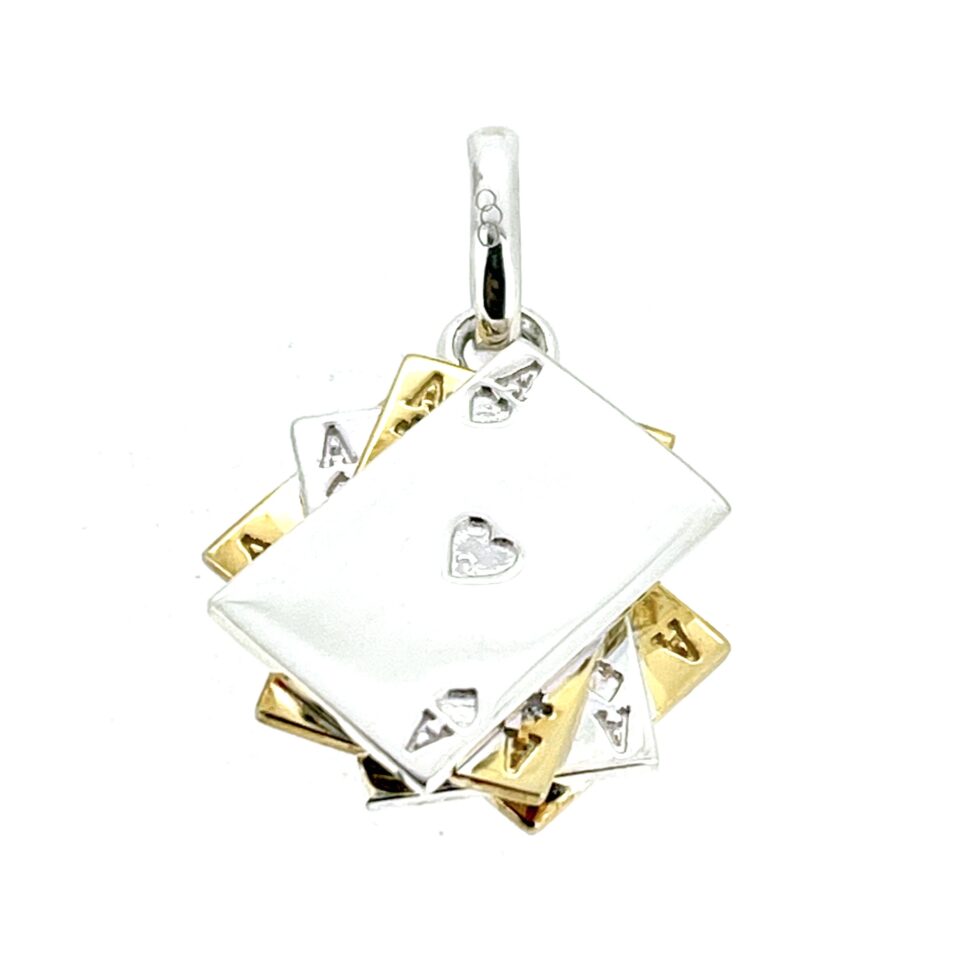 Top view of stacked miniature ace cards charm