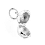 Sterling silver Links globe charm opened as locket.