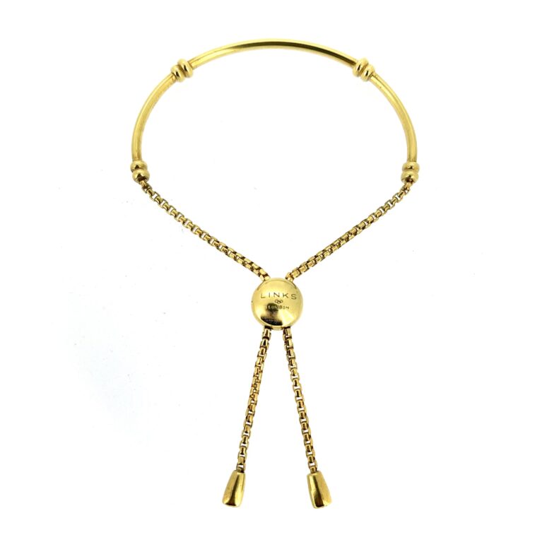 Vintage Links of London half bangle and chain toggle bracelet flat lay
