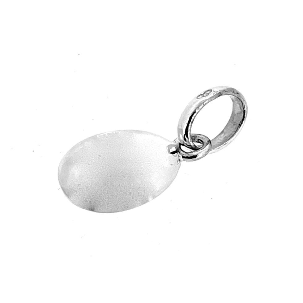 Egg charm side view showing curved profile