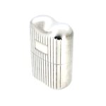 Close-up of ribbed detailing on perfume atomiser exterior