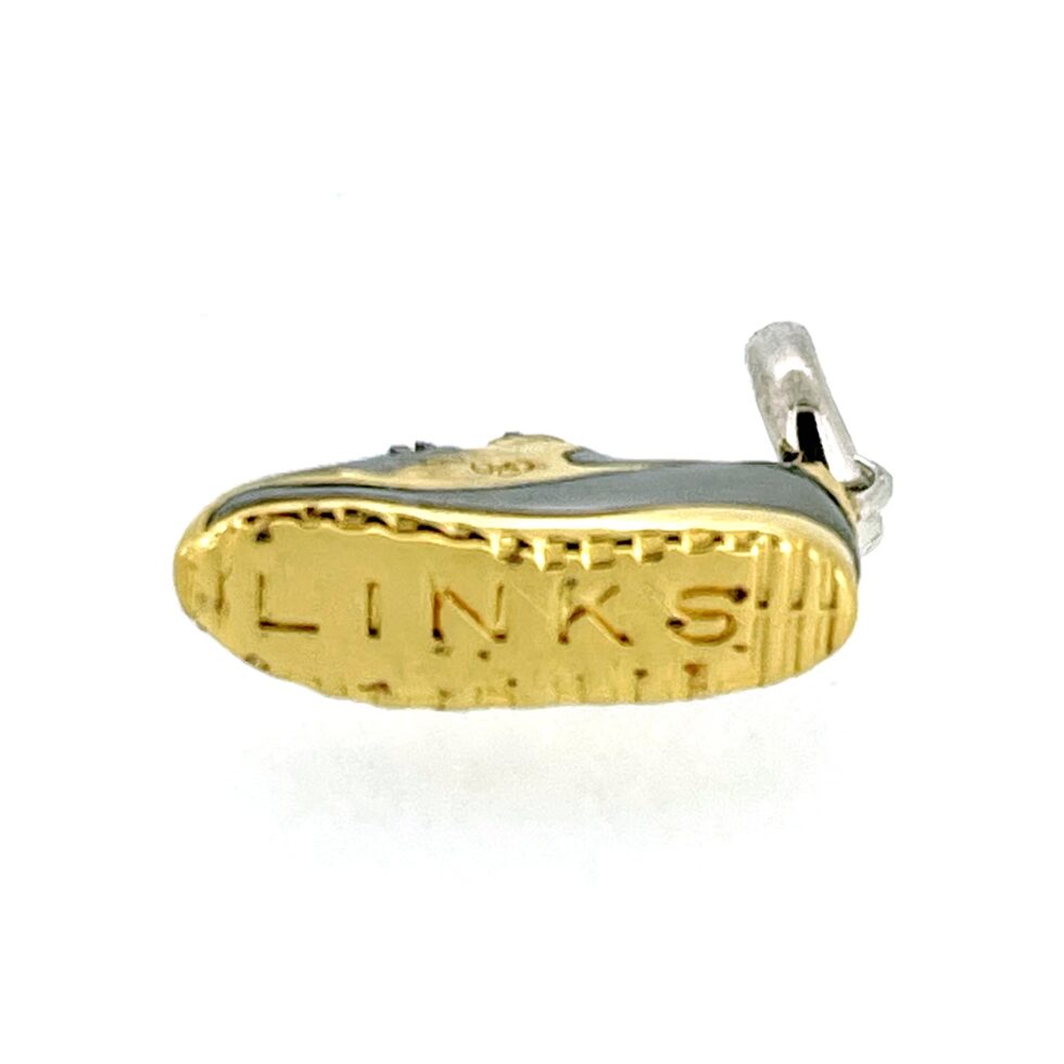 Bottom of charm showing ‘LINKS’ engraving on sole