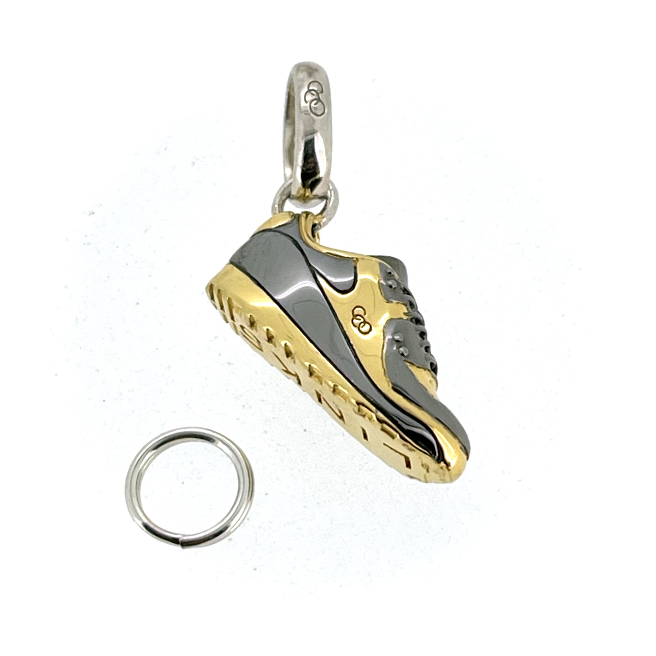 Close-up of vintage Links of London trainer charm – NOS condition