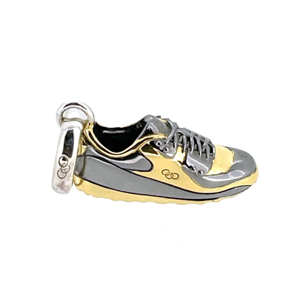 Trainer charm with visible bail and hallmark