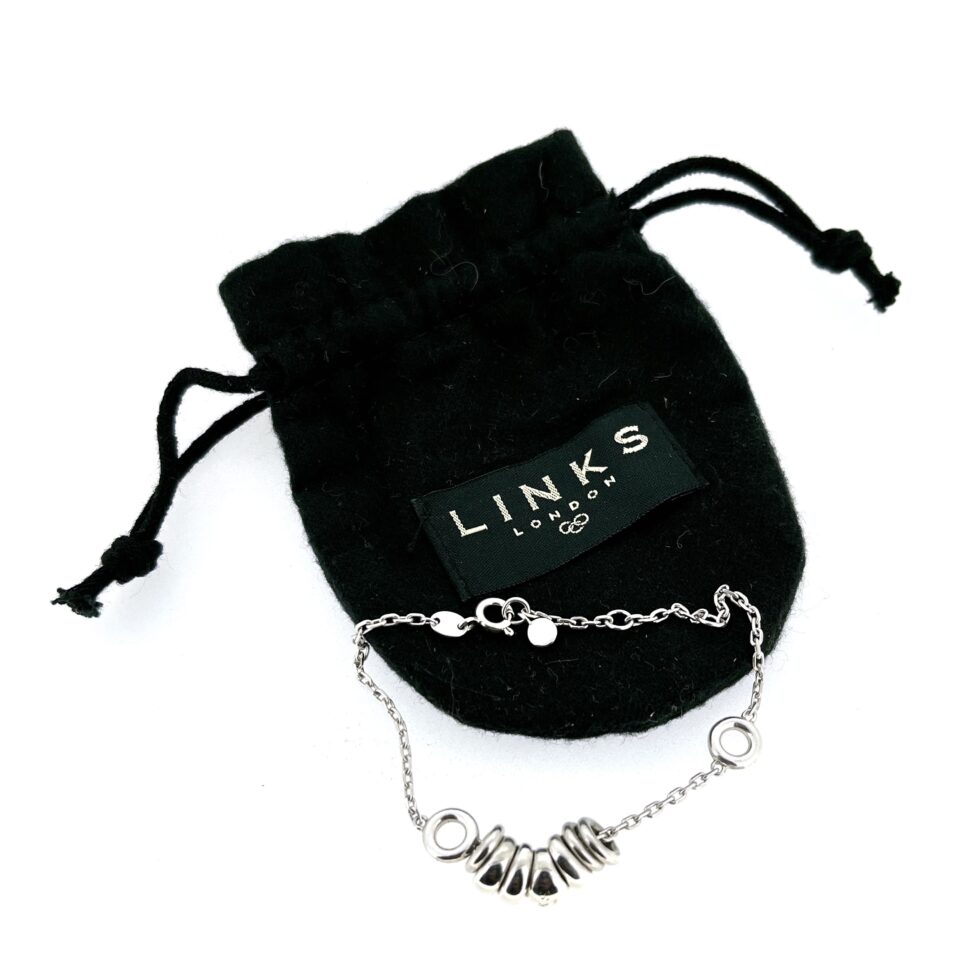 Sweetie Drop Bracelet in vintage black drawstring pouch