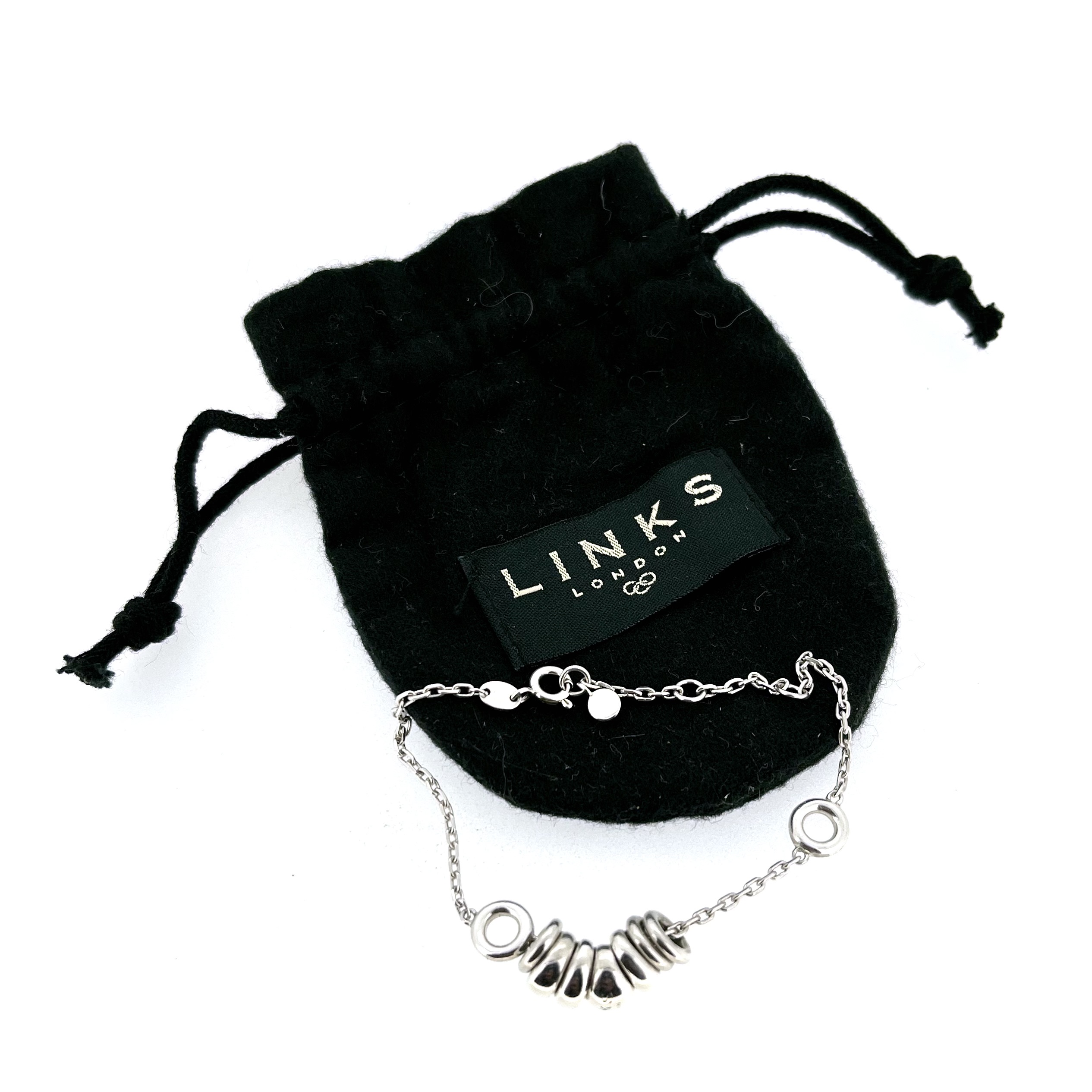Sweetie Drop Bracelet in vintage black drawstring pouch