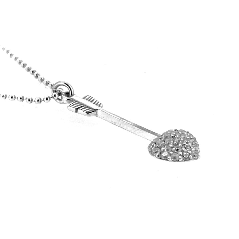 Close-up of pavé-set heart arrowhead