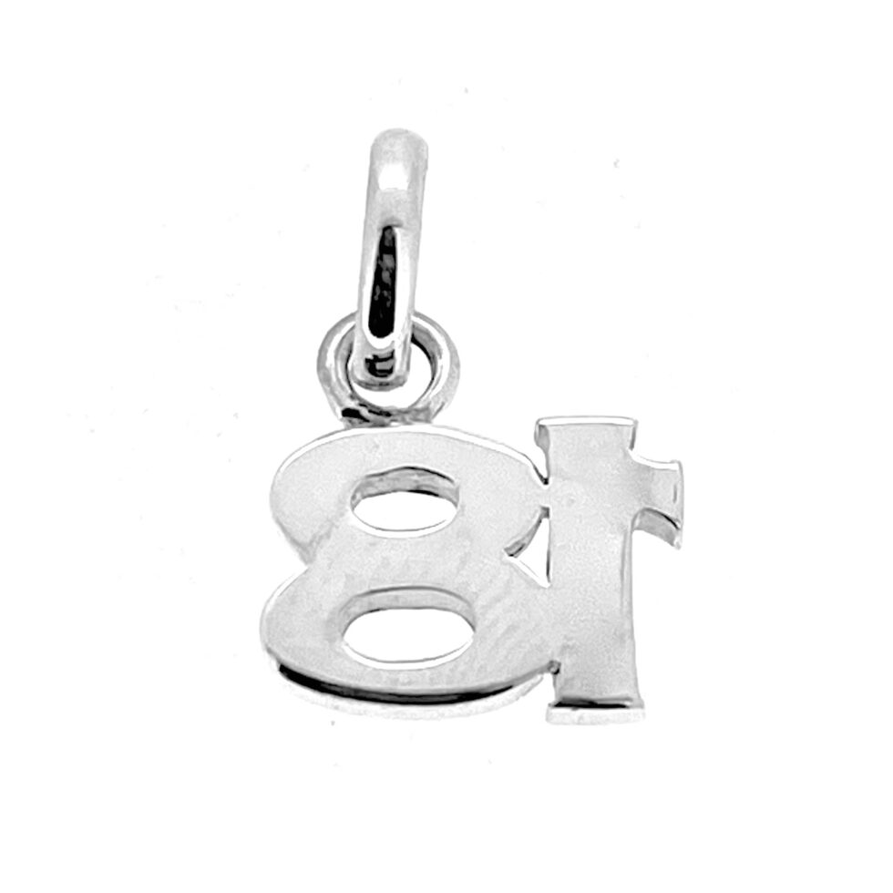 Vintage birthday charm photographed flat
