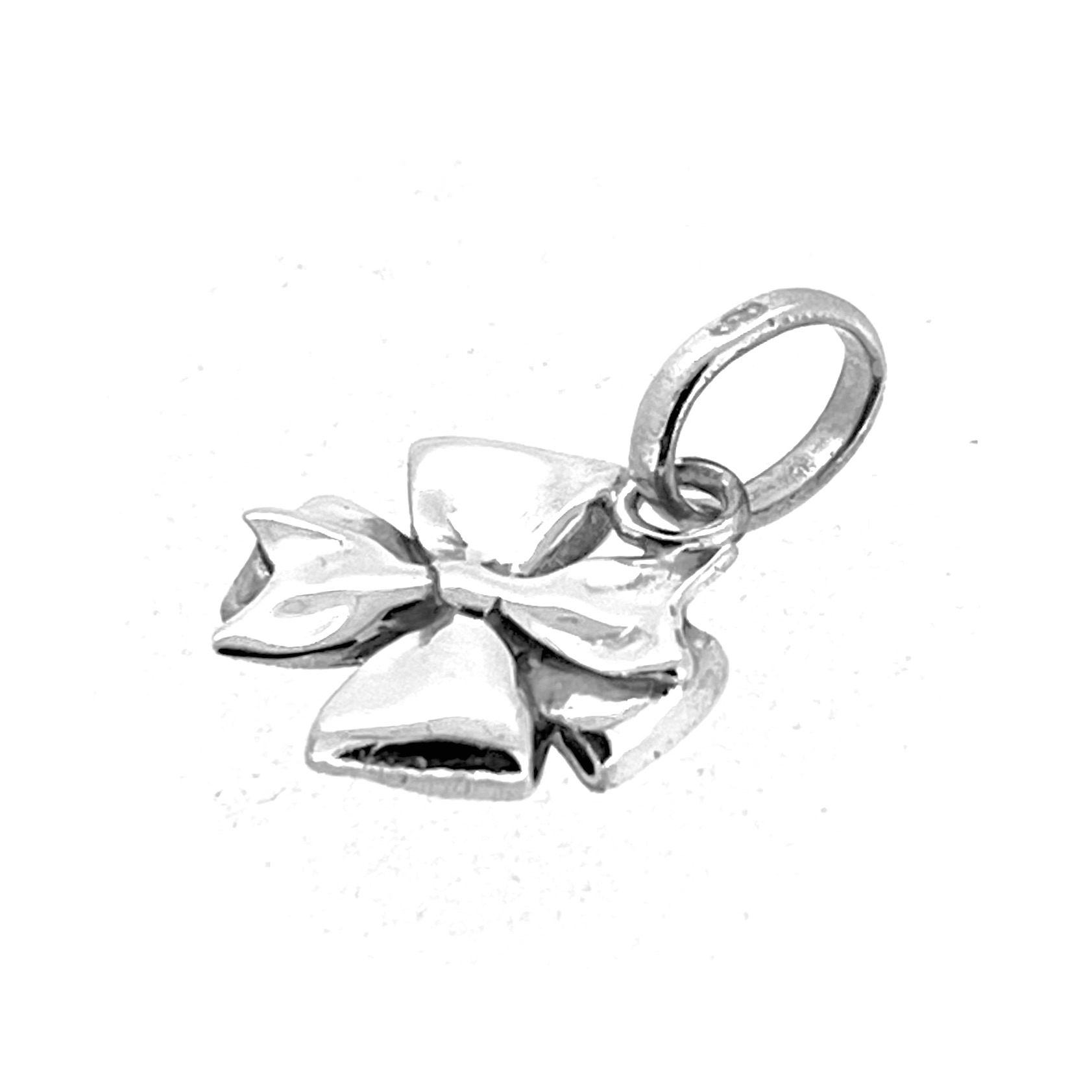 Vintage silver bow charm cleaned and polished