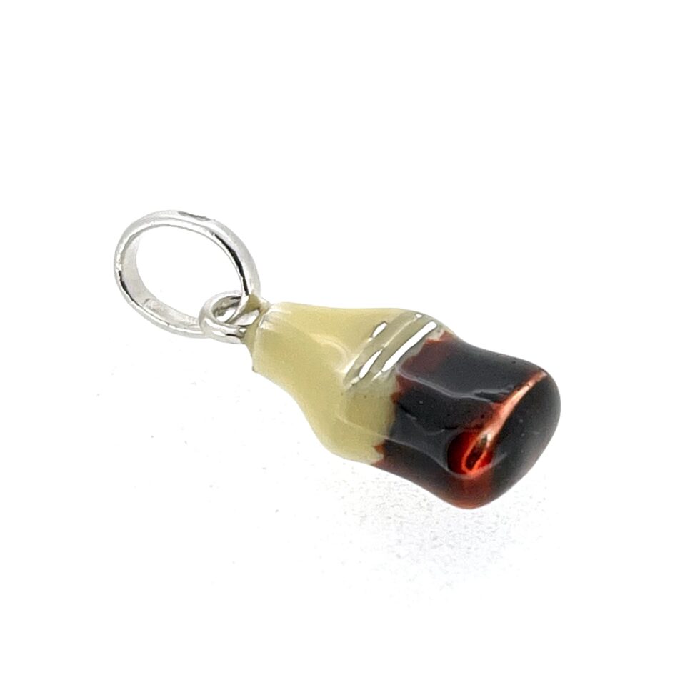 Sterling silver cola bottle charm with worn enamel tip