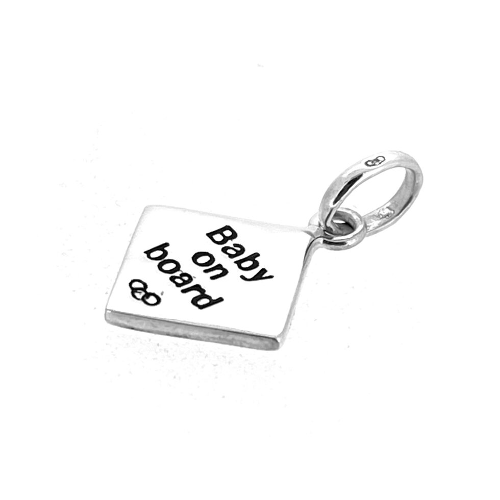 Polished vintage Baby on Board Charm front and side view