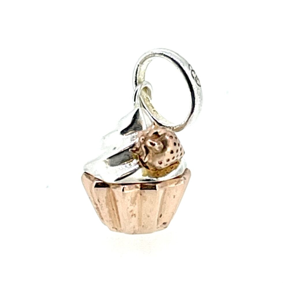 Charm shaped like a cupcake with frosting detail