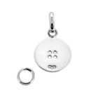 Macro close-up vintage Four Hole Button Charm in silver finish
