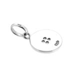 Sterling silver vintage Button Charm on neutral background
