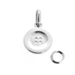 Macro view of vintage Button Charm hallmark and polish