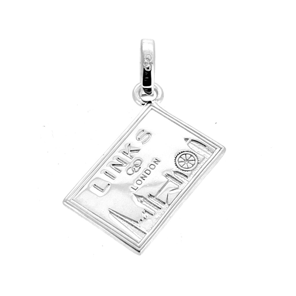 Close-up of London skyline engraving on Links of London postcard charm