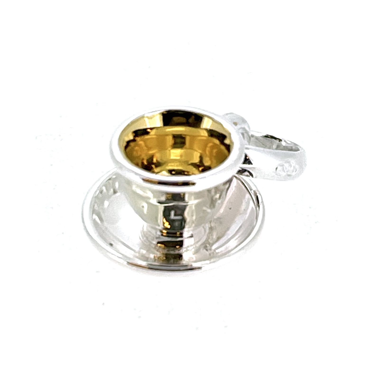 High-angle photo of Tea Cup & Saucer charm