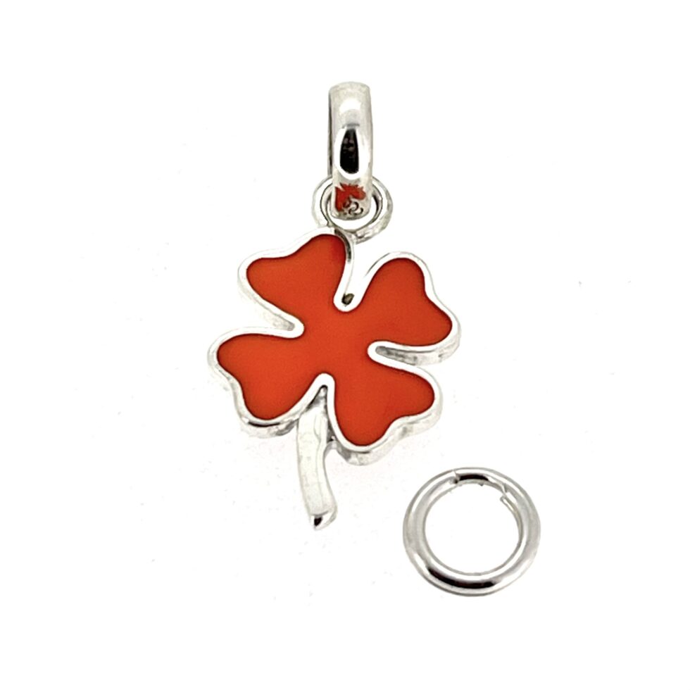 Sterling silver four leaf clover charm with orange enamel detail